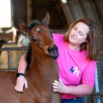Nicola petting horse
